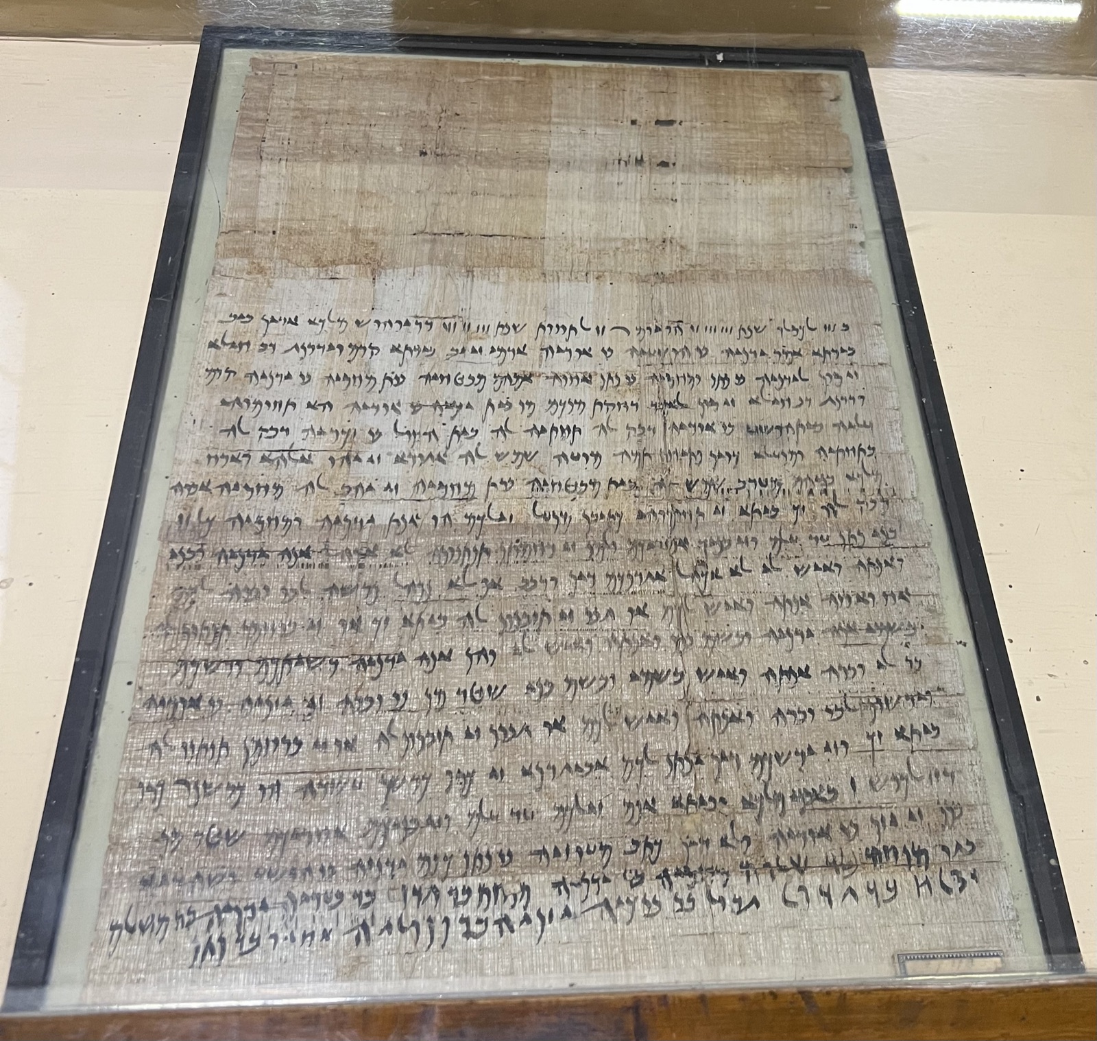 A papyrus of the Mibtahiah archive (Sayce and Cowley 1906, papyrus J; Cairo J 37113) — dense Aramaic lines on a wide, creased sheet.
